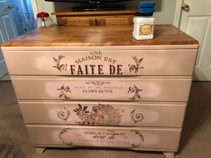 21 ways to redo that old dresser you can t stand looking at anymore, Dress up an old dresser with vintage transfers