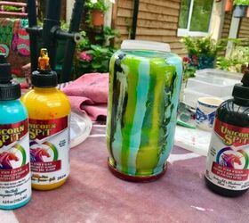 how to create a vibrant planter from old jar, Let excess paint run to the lid