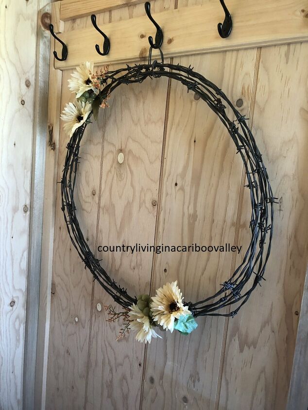 s 15 fall wreaths to kick off our favorite season, Metal art wreath Grab the gloves for this one
