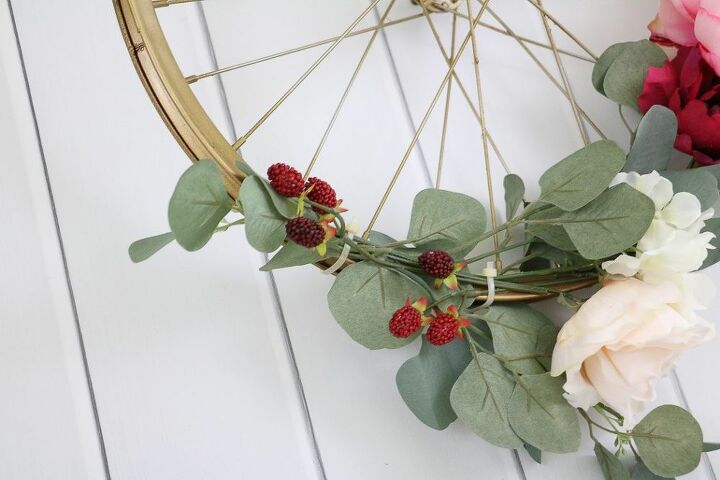 an cheerful autumn wreath made from a bike