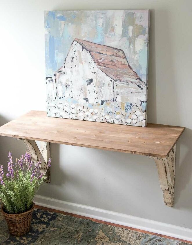 s 17 ways to enhance your entryway and give a great first impression, This DIY corbel table is a great place to throw your keys and phone when you walk in the door
