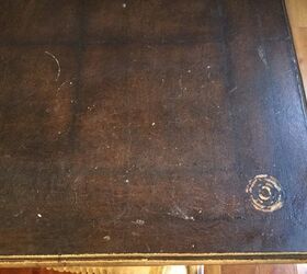 how can i fix a faux leather table top that has marks from wear