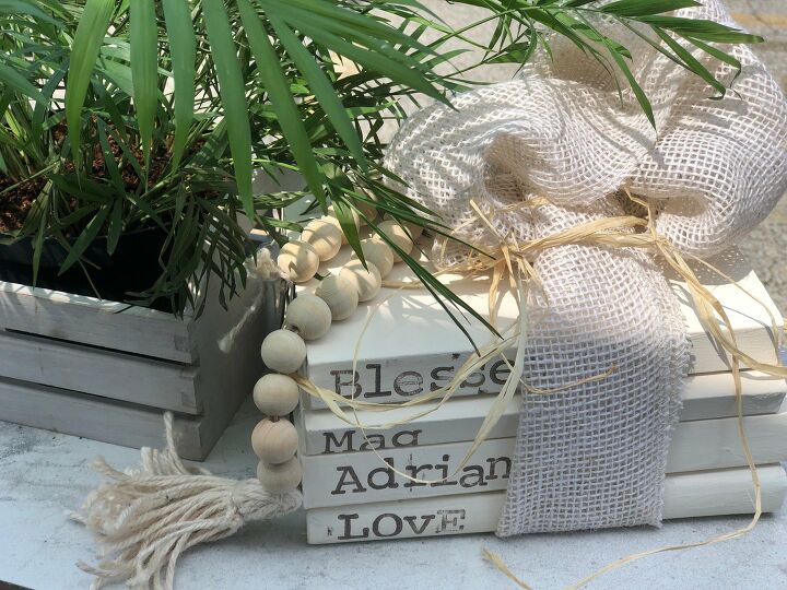 s 21 farmhouse accents to add to your home, This farmhouse book stack is just adorable