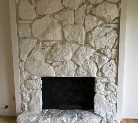 s 8 fireplace makeovers you have to see before winter, BEFORE This homeowner just wasn t feeling this stone fireplace