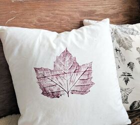 25 gorgeous ways to let everyone know that it s finally september, Fall decor throw pillows stamped with leaves