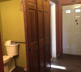repurposing doors into a sliding door, Entrance to bathroom with door open