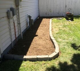 replaced some lawn with a rock garden, Sod removed edging in place