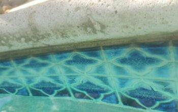 How can I clean grout in the pool?