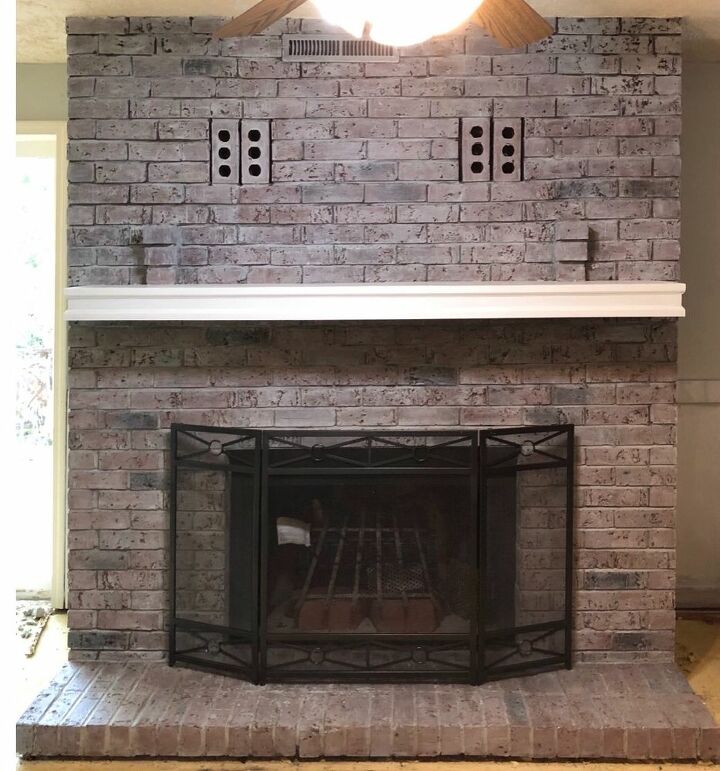 an amazing fireplace transformation from outdated to modern