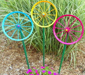 repurposed doll carriage wheel flowers
