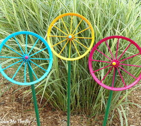 repurposed doll carriage wheel flowers