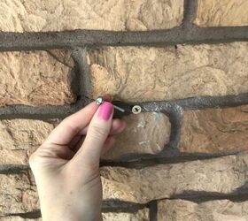 how to hang on brick