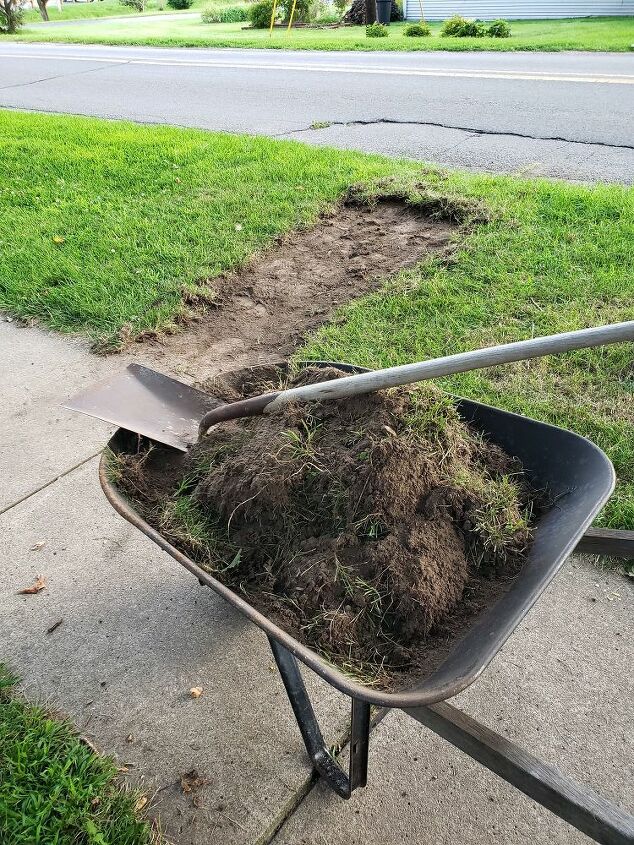 how we made a simple diy walkway for our cute bicycle mailbox, Removing sod from the area