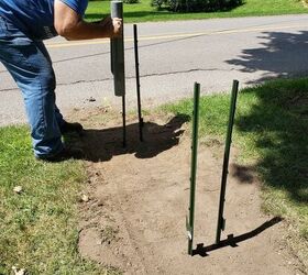 how we made a simple diy walkway for our cute bicycle mailbox, Adding fence posts