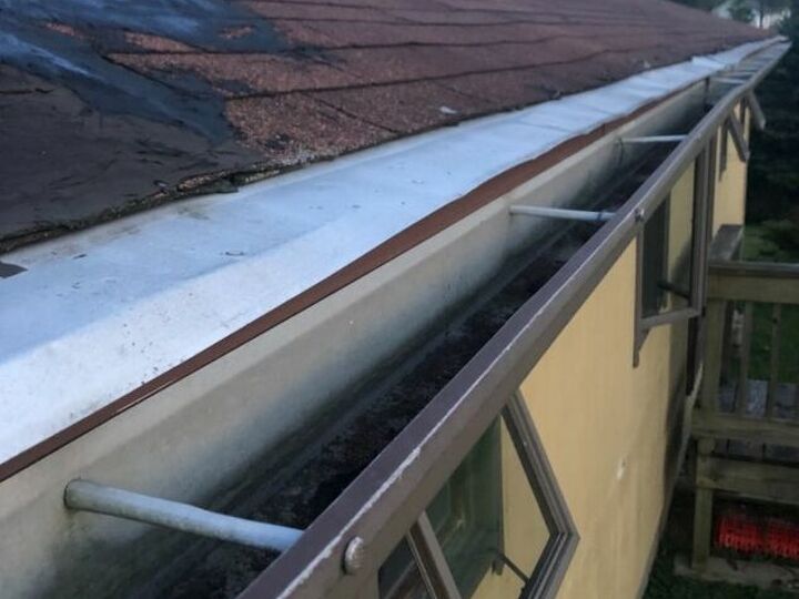 q the roof on my house has flashing instead of a last row of shingles