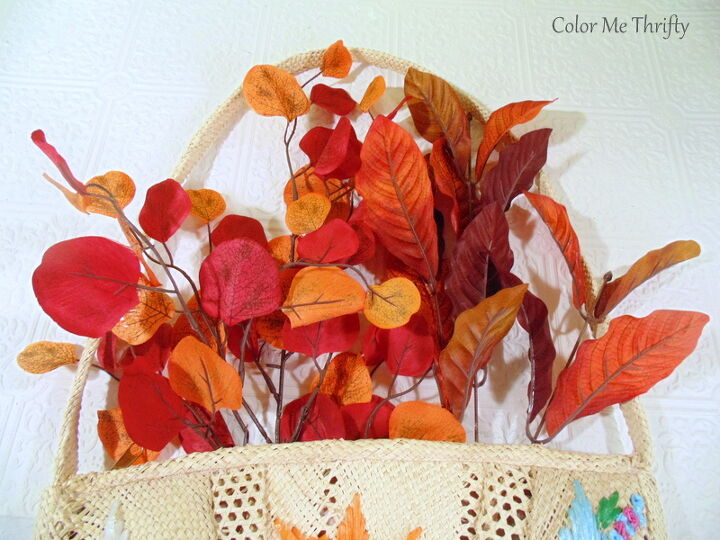 create fall door decor with a straw purse