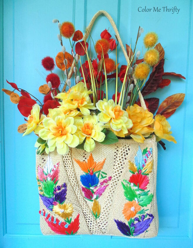 create fall door decor with a straw purse