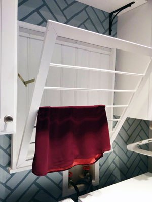 the 15 best laundry room storage solutions you need to try, 7 High and Dry Laundry Room Rack