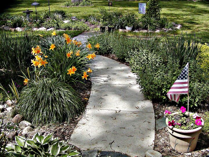 20 inspirational ideas for creating a beautiful outdoor walkway, 8 Flower Filled Outdoor Walkway Ideas