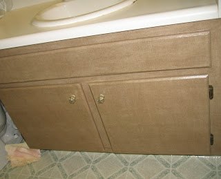 14 successful bathroom cabinet makeovers, 3 Decoupage Inspired Bathroom Linen Cabinet