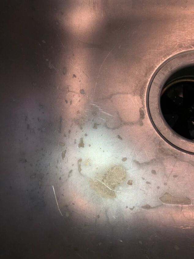 how do i remove this discoloration from this stainless steel sink