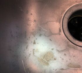 How do I remove this discoloration from this stainless steel sink