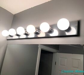 bathroom vanity light updated with spray paint super simple