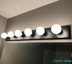bathroom vanity light updated with spray paint super simple