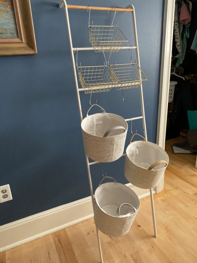 how i use a leaning towel rack and s hooks to sort laundry