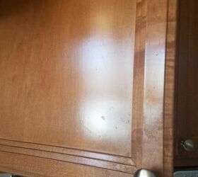 how can i clean these wood kitchen cabinets picture
