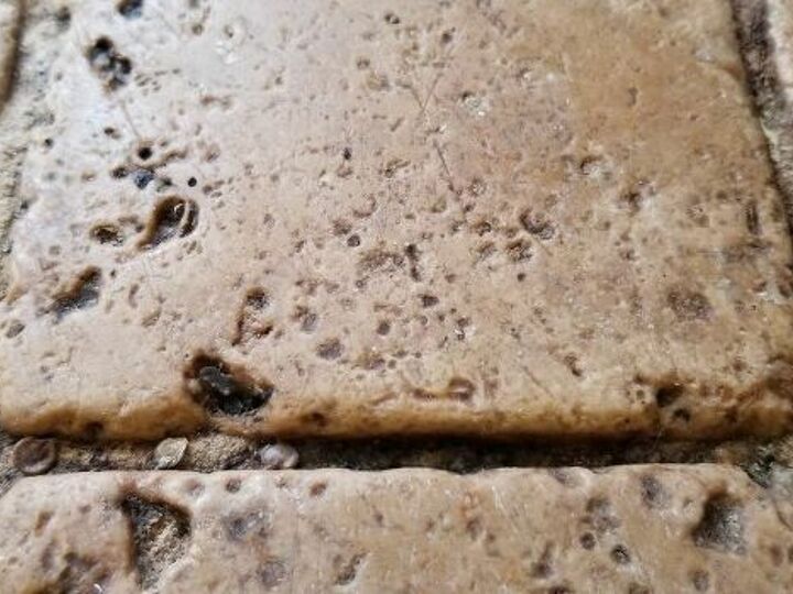 q my old house has ceramic tile squares with holes and pits for texture