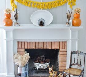 s 30 pumpkin projects for people that are totally obsessed with pumpkins, Simple symmetrical fall mantel