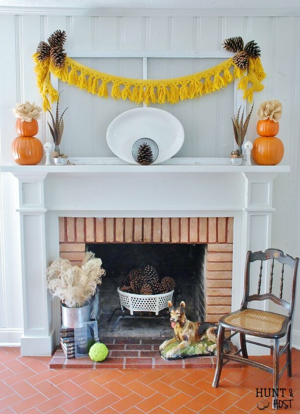 s 30 pumpkin projects for people that are totally obsessed with pumpkins, Simple symmetrical fall mantel