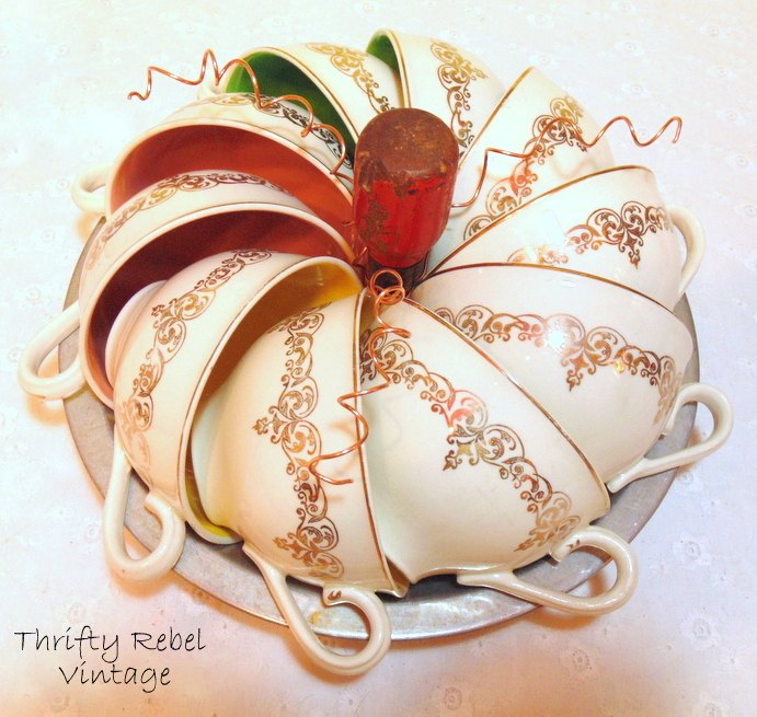 s 30 pumpkin projects for people that are totally obsessed with pumpkins, Vintage repurposed teacup pumpkin