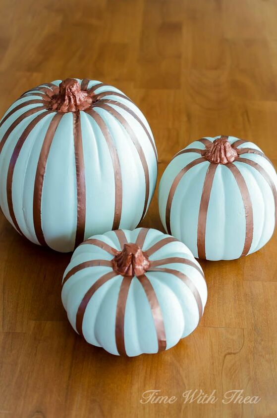 s 30 pumpkin projects for people that are totally obsessed with pumpkins, Painted pumpkins using washi tape