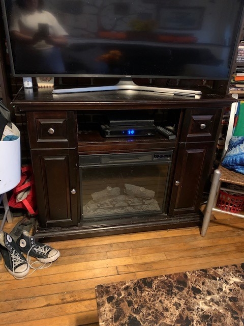 q how do i update this entertainment center faux fireplace