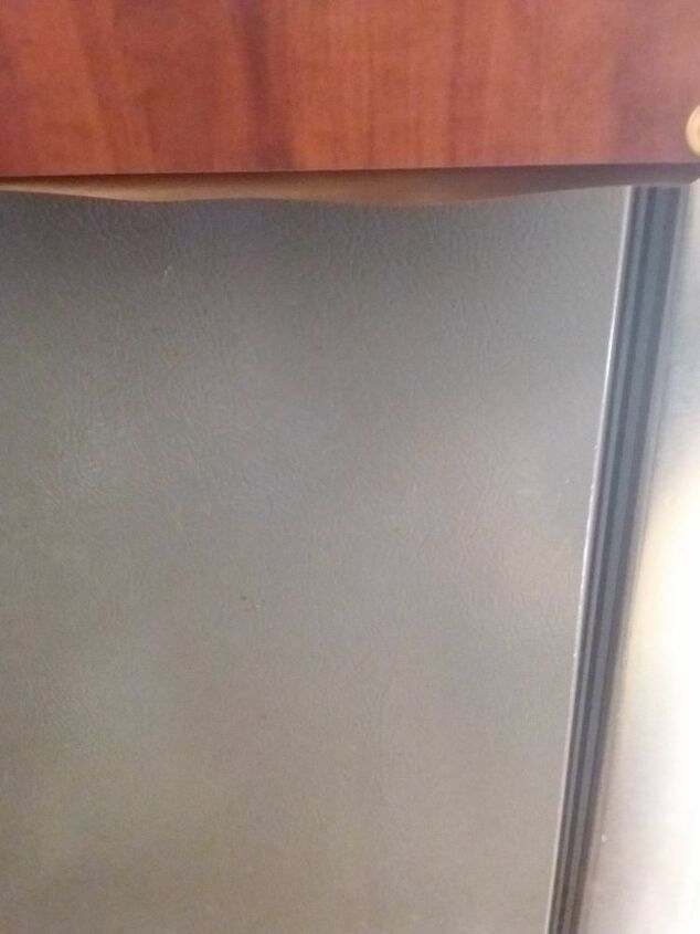 how can i repair peeling kitchen cabinet laminate