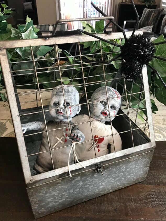 16 spooky halloween decor ideas that will scare your guests, Zombie babies