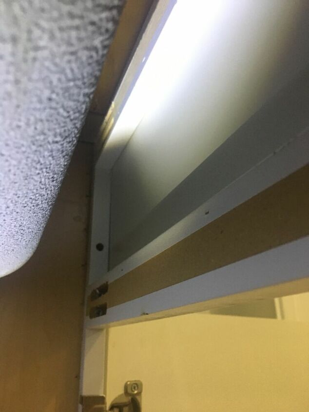 how do i remove this false front cabinet