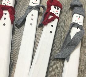 wood stake snowmen