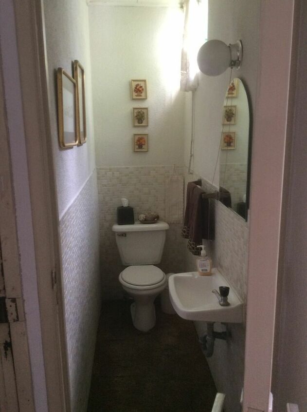 q how can i make this small narrow bathroom look bigger