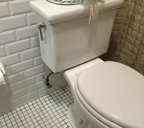 How can i minimize a 3 inch space between the wall and toilet tank