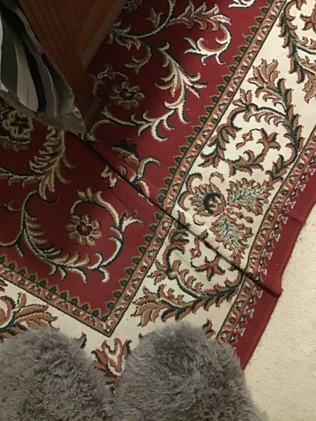 how do i stop a rug that is under my bed from bunching up