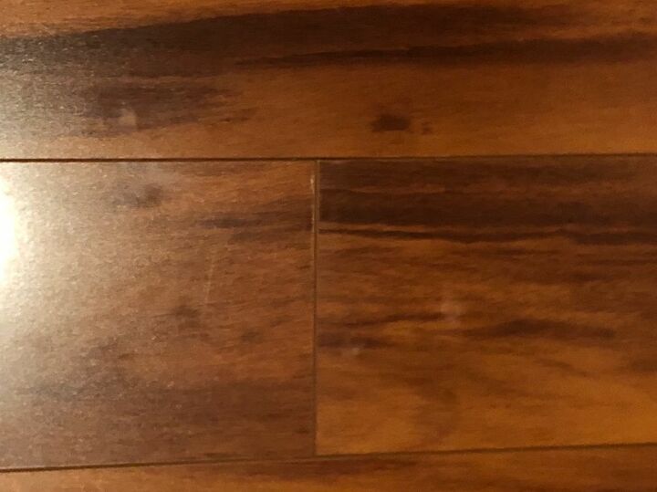 q what are these weird white marks on my laminate and how do i clean it