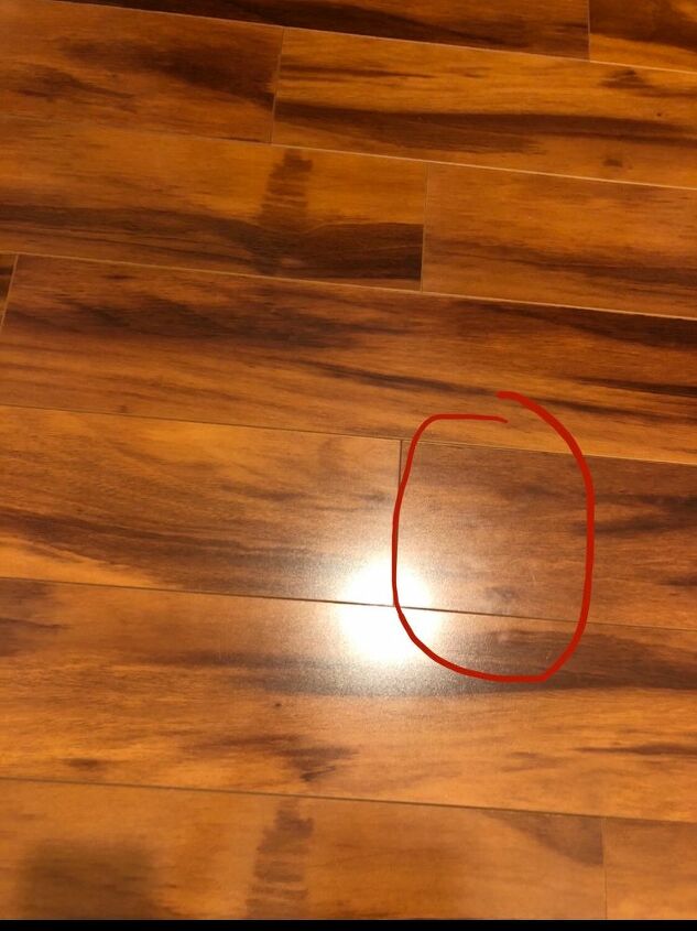 q what are these weird white marks on my laminate and how do i clean it