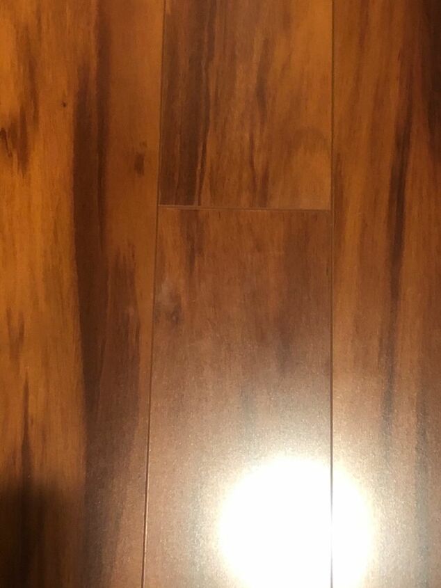 q what are these weird white marks on my laminate and how do i clean it