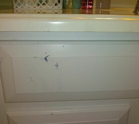 how can i remove hair dye stains from a porcelain top vanity