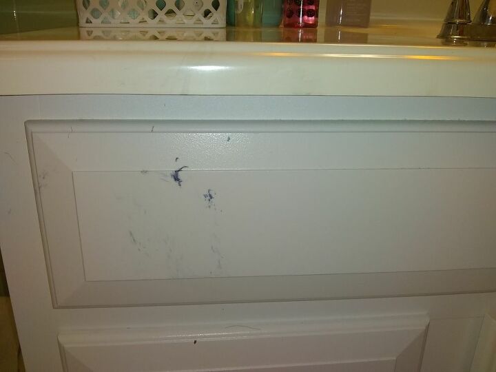 how can i remove hair dye stains from a porcelain top vanity