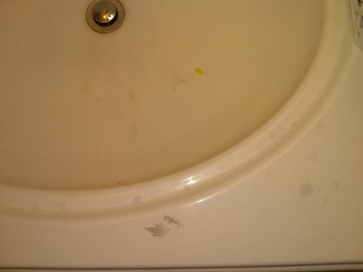 how can i remove hair dye stains from a porcelain top vanity