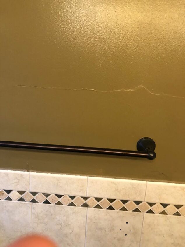 q any idea to conceal plaster wall cracks in a bathroom